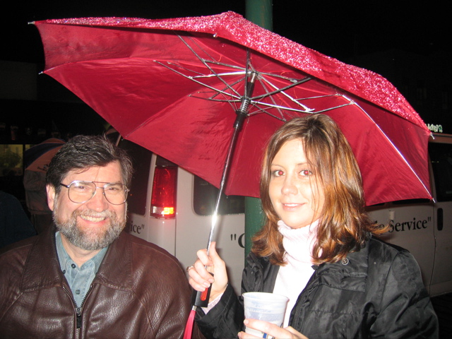 "Look...Her "red eye" Matches Her Umbrella..."